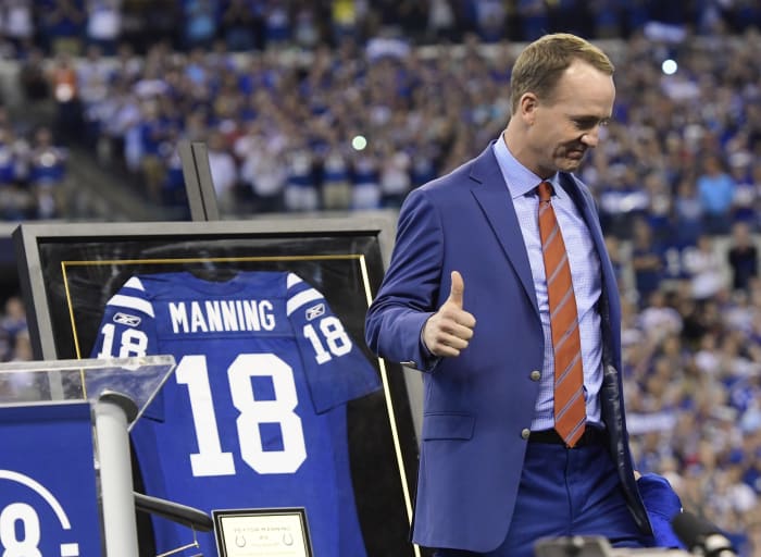 Peyton Manning gives a thumbs up after being inducted into the Indianapolis Colts Ring of Honor in 2017.